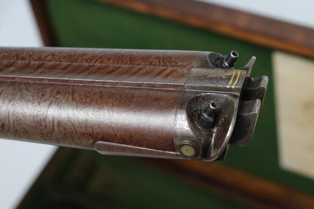 A HOLLIS & SHEATH 12 BORE DOUBLE BARRELLED PERCUSSION SHOTGUN Image