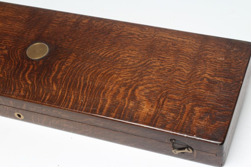 A HOLLIS & SHEATH 12 BORE DOUBLE BARRELLED PERCUSSION SHOTGUN Image