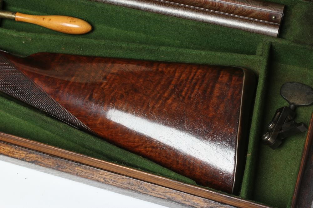 A HOLLIS & SHEATH 12 BORE DOUBLE BARRELLED PERCUSSION SHOTGUN Image