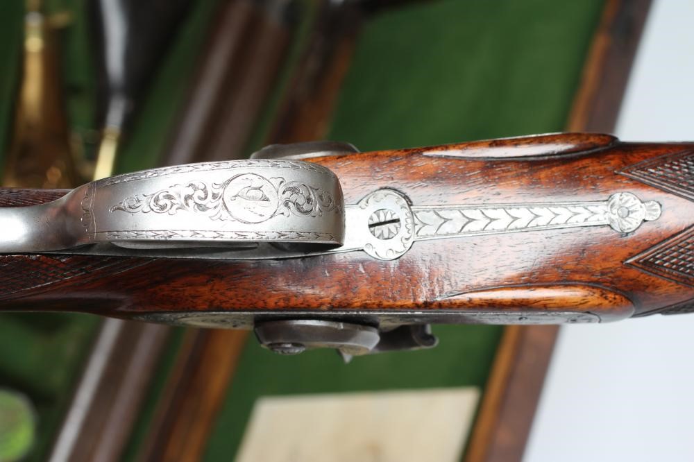 A HOLLIS & SHEATH 12 BORE DOUBLE BARRELLED PERCUSSION SHOTGUN Image