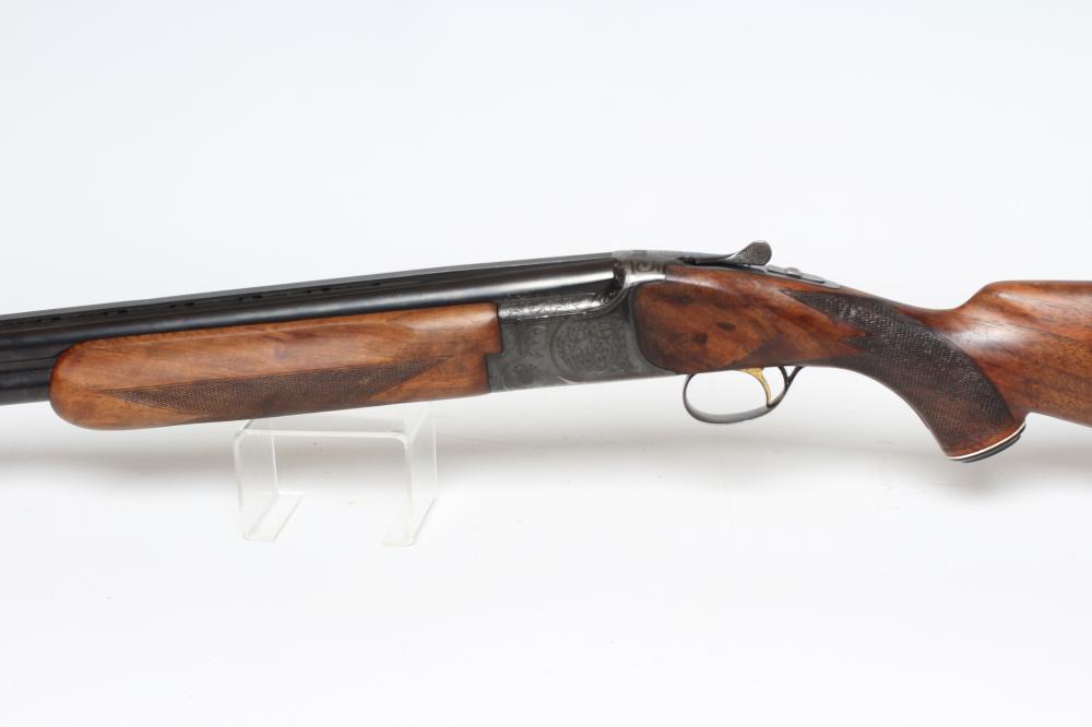 A MIROKU OVER & UNDER 12 BORE SHOTGUN Image