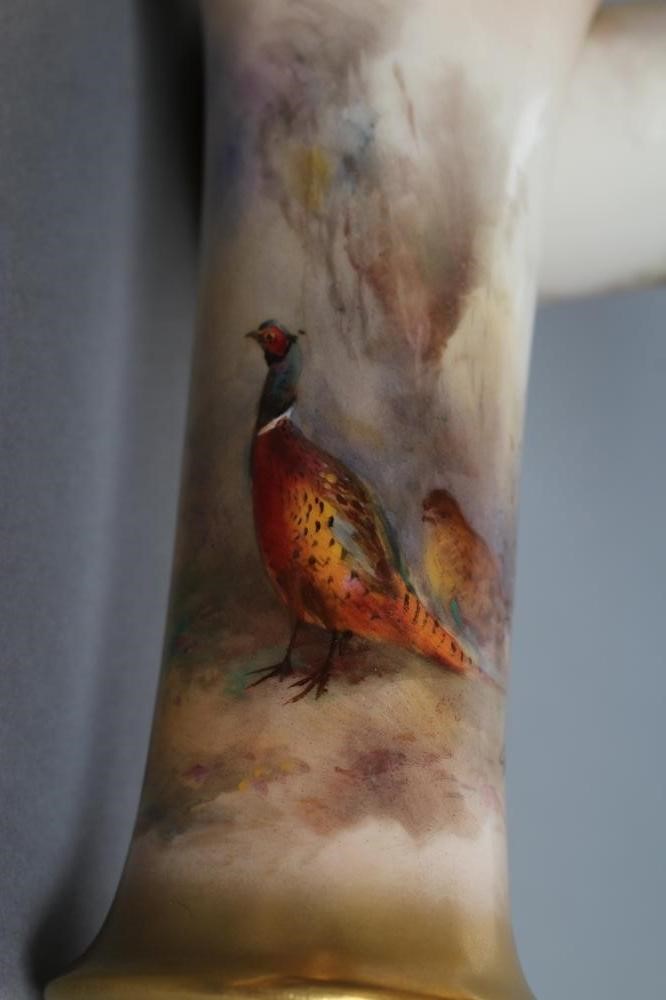 A PAIR OF ROYAL WORCESTER CHINA SMALL VASES Image