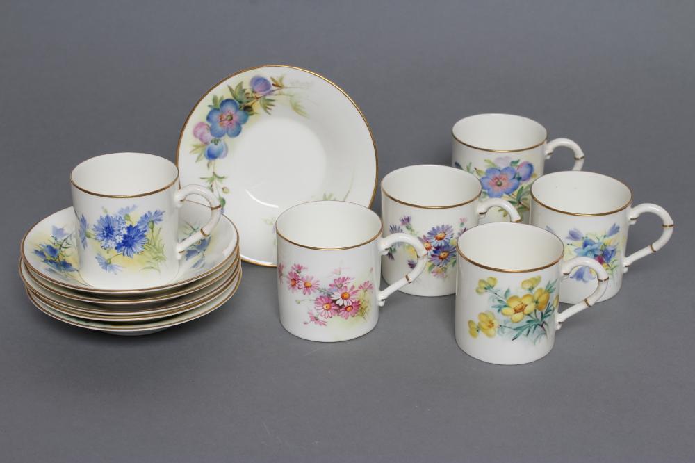 A SET OF FOUR ROYAL WORCESTER CHINA COFFEE CANS AND SAUCERS Image