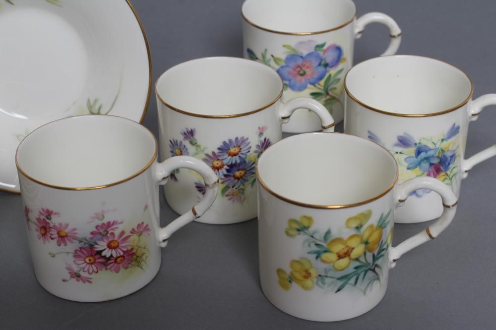 A SET OF FOUR ROYAL WORCESTER CHINA COFFEE CANS AND SAUCERS Image
