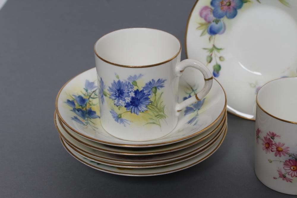 A SET OF FOUR ROYAL WORCESTER CHINA COFFEE CANS AND SAUCERS Image
