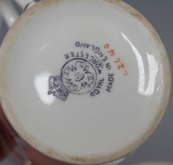 A SET OF FOUR ROYAL WORCESTER CHINA COFFEE CANS AND SAUCERS Image