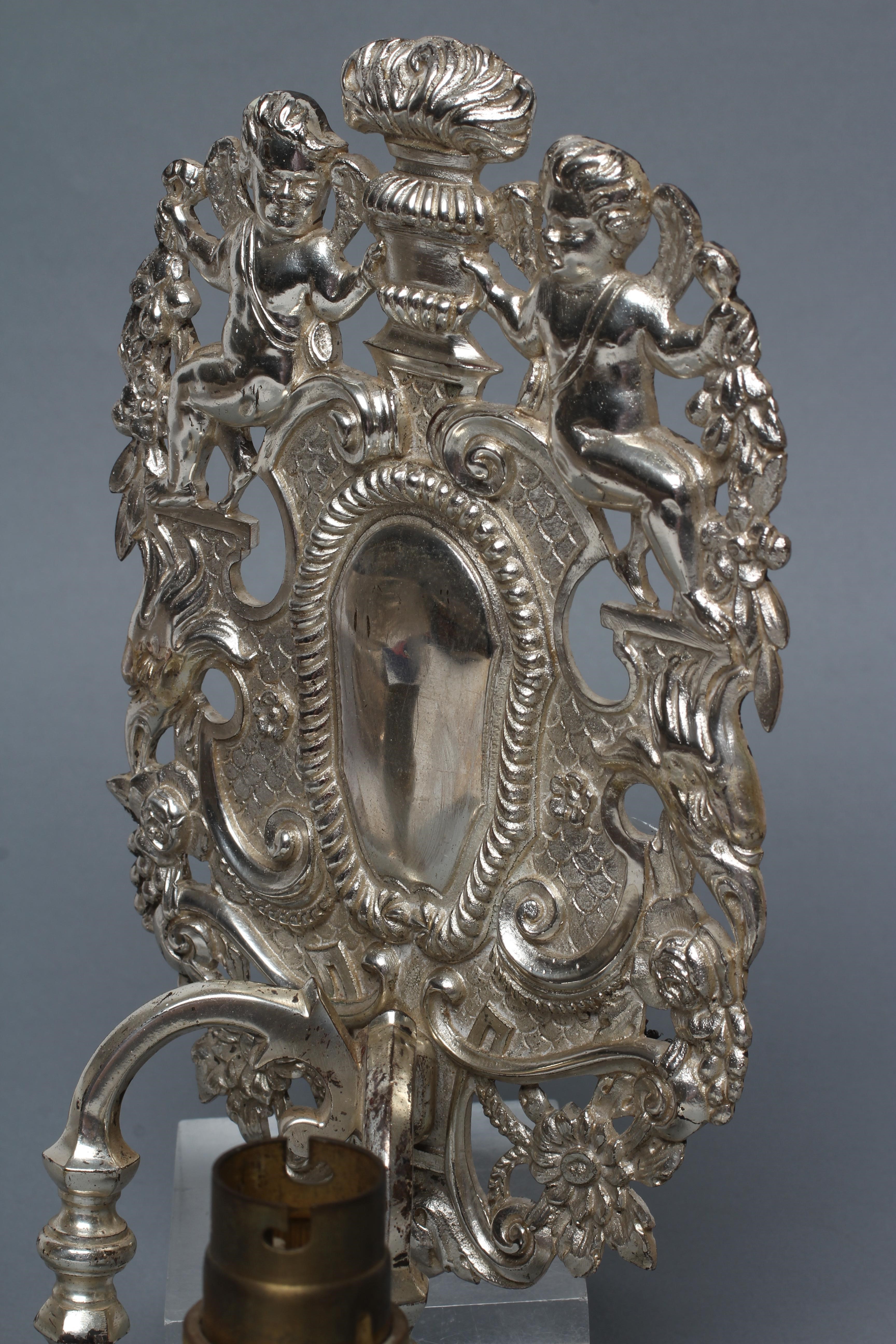 A PAIR OF SILVERED METAL TWIN BRANCH WALL SCONCES in the William & Mary style Image