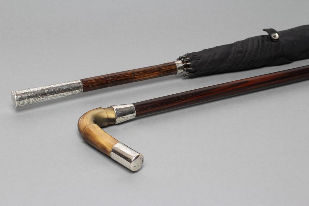 A ROSEWOOD WALKING CANE Image