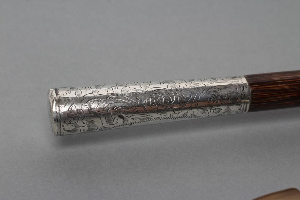 A ROSEWOOD WALKING CANE Image