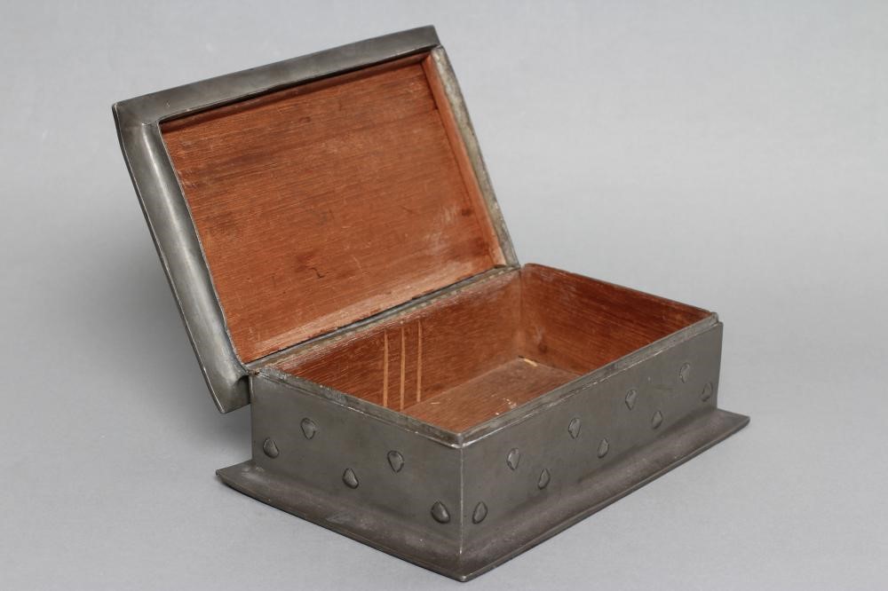 A TUDRIC PEWTER CIGARETTE BOX designed by Archibald Knox Image