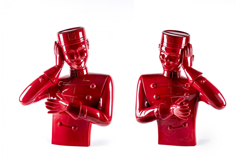 A PAIR OF LOUIS VUITTON BELL BOY ADVERTISING FIGURES in red plastic with foam centre Image