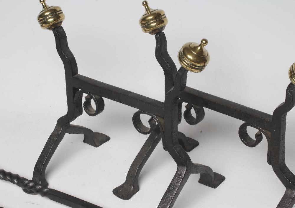 A SET OF ARTS AND CRAFTS STYLE WROUGHT IRON FIRE IMPLEMENTS Image