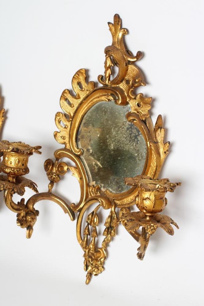 A PAIR OF ROCOCO STYLE GILT METAL GIRONDOLES Image