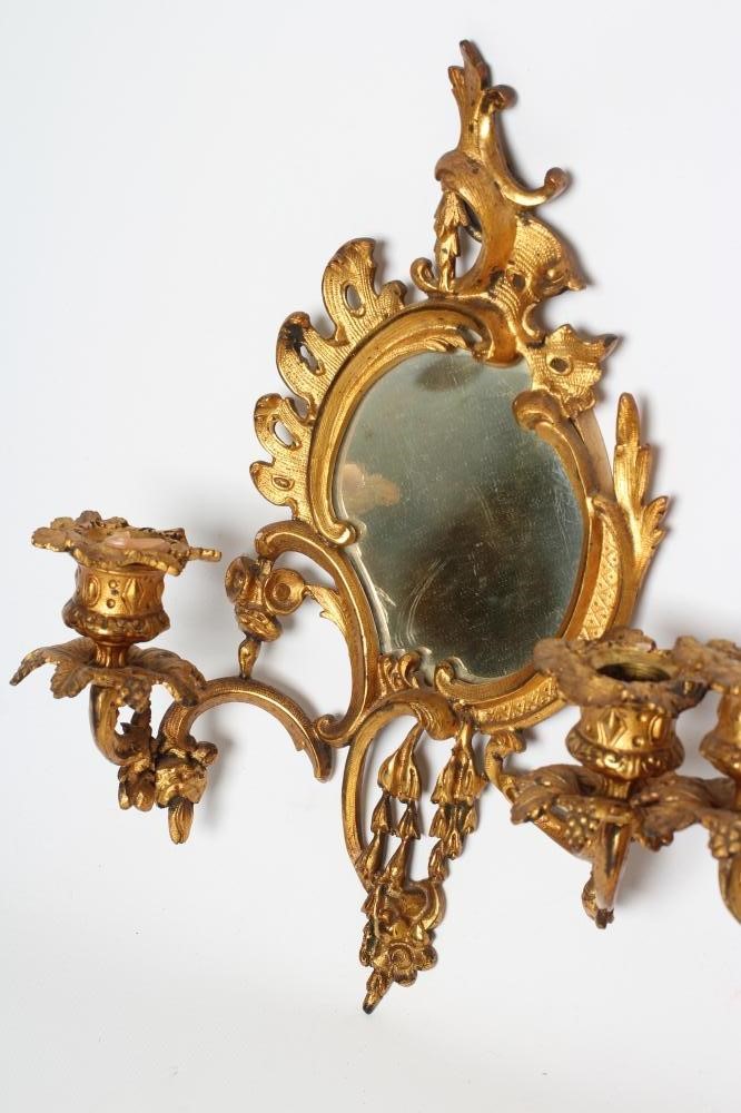 A PAIR OF ROCOCO STYLE GILT METAL GIRONDOLES Image