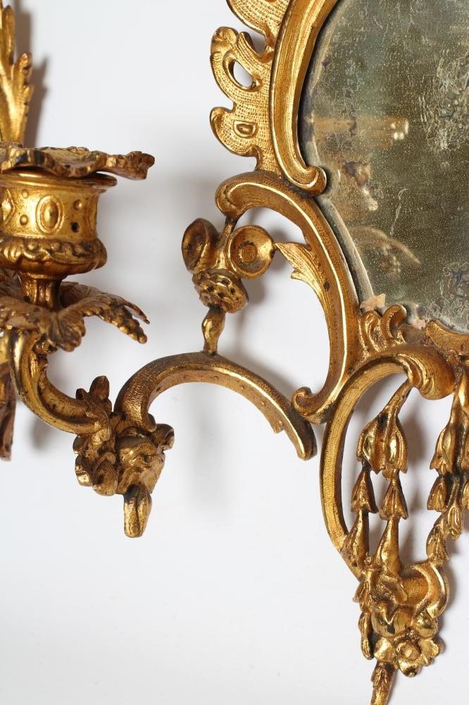 A PAIR OF ROCOCO STYLE GILT METAL GIRONDOLES Image