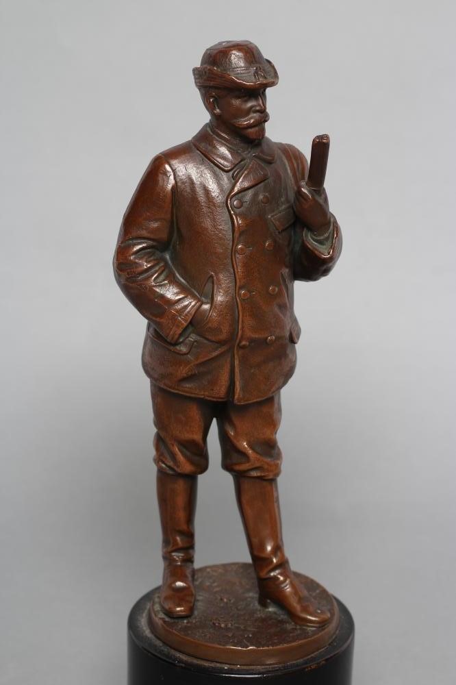 A BRONZE FIGURE of a male hunter Image