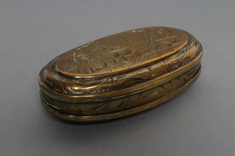 AN ANGLO-DUTCH OVAL BRASS TOBACCO BOX Image