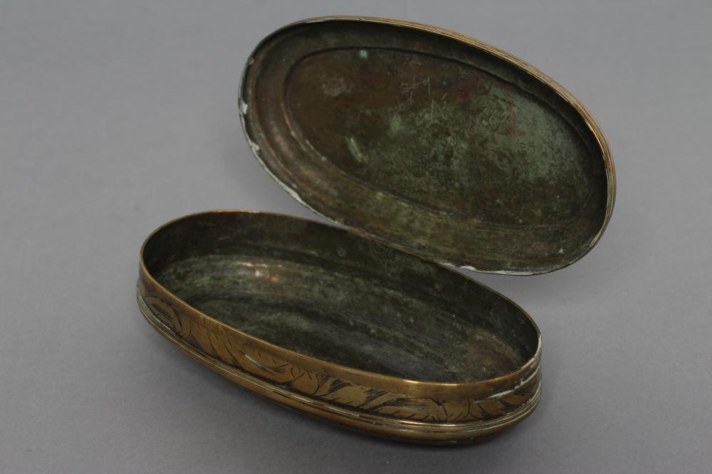 AN ANGLO-DUTCH OVAL BRASS TOBACCO BOX Image