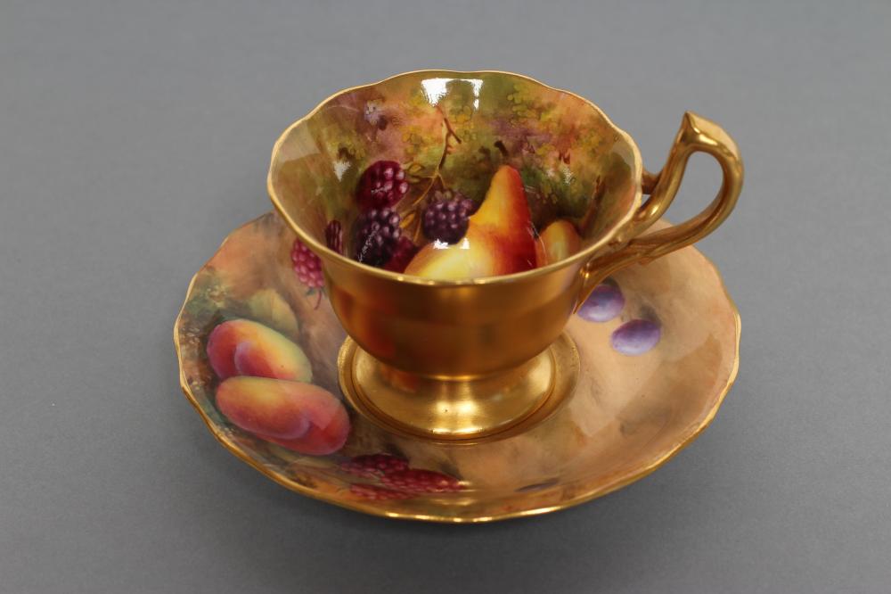 A ROYAL WORCESTER CHINA CABINET CUP AND SAUCER Image