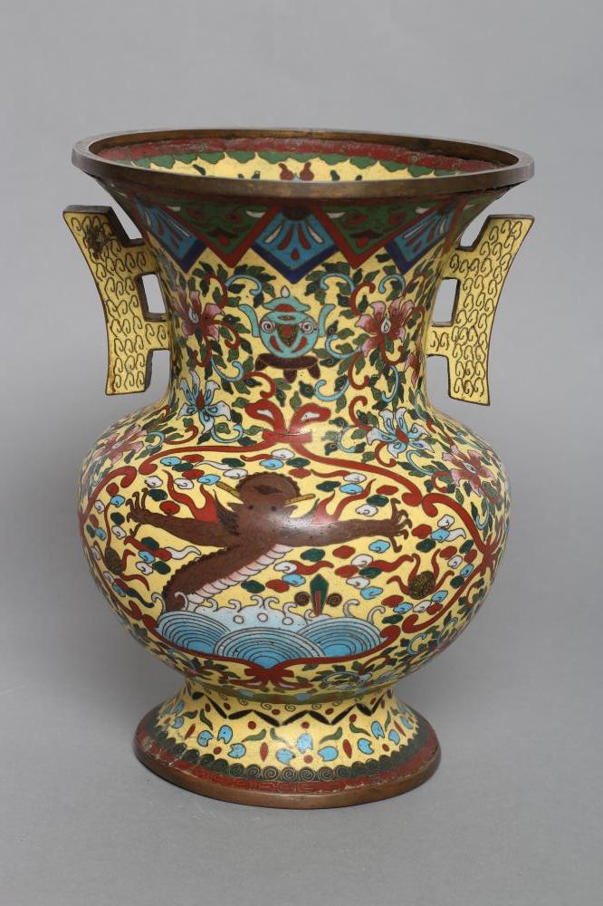 A CHINESE CHAMPLEVE ENAMEL VASE of baluster form with two angular handles Image