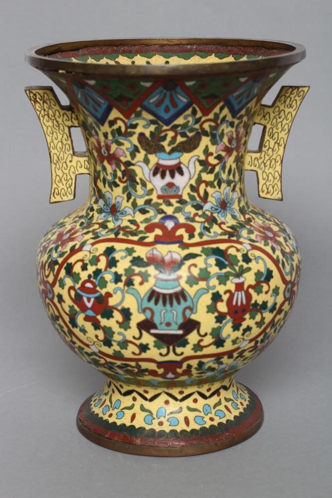 A CHINESE CHAMPLEVE ENAMEL VASE of baluster form with two angular handles Image