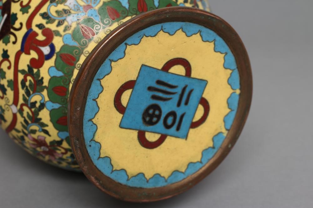 A CHINESE CHAMPLEVE ENAMEL VASE of baluster form with two angular handles Image