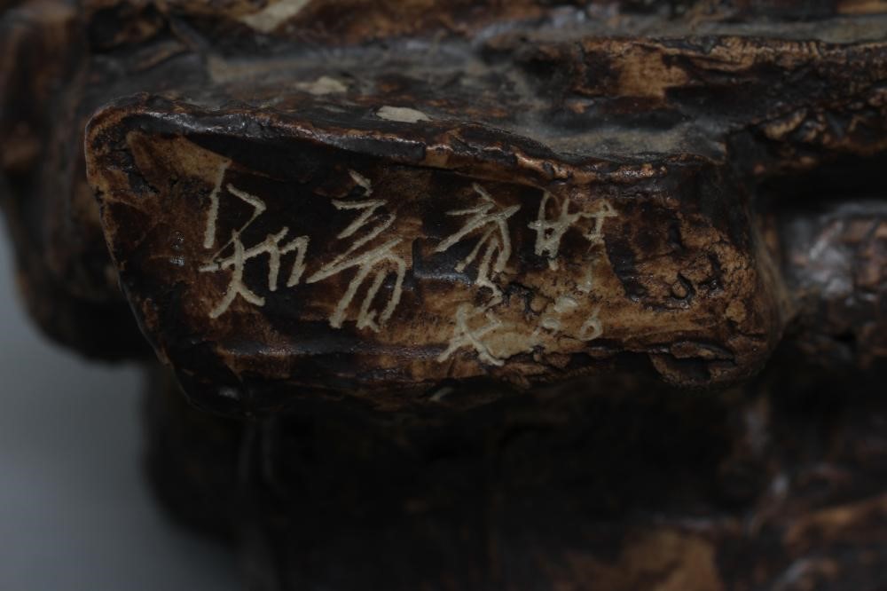 A CHINESE SHIWAN STONEWARE FIGURE Image