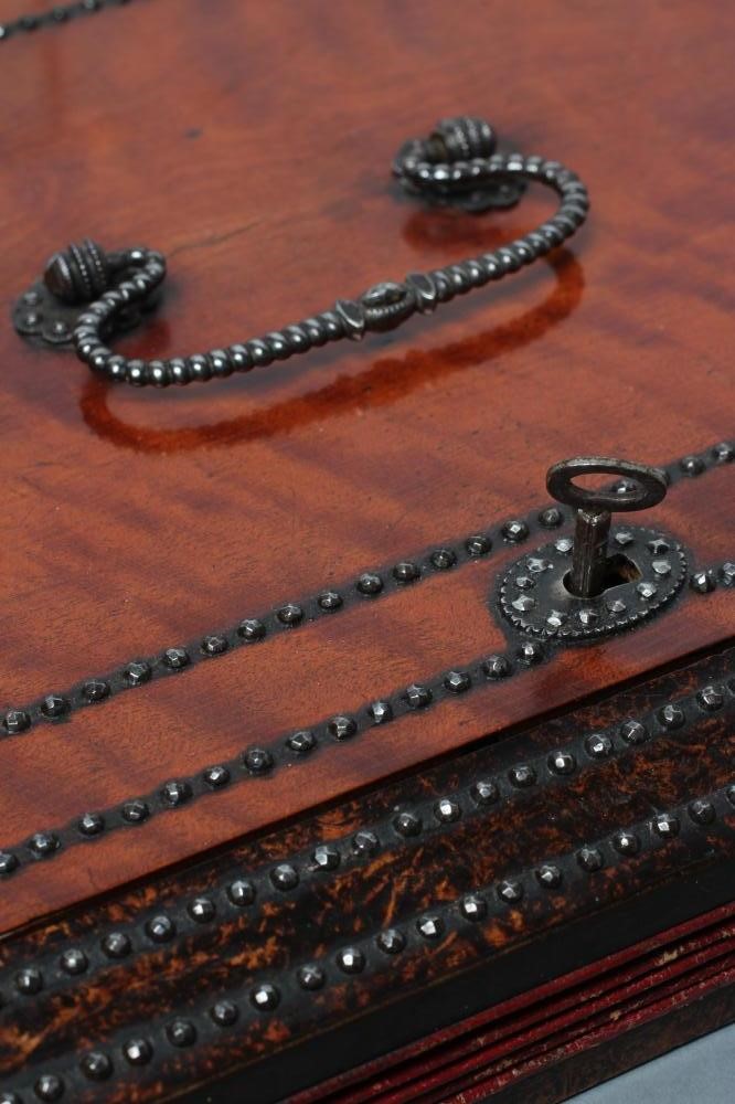 A VICTORIAN EXPANDING DAVENPORT BOX of oblong form with steel stud and painted faux burr wood Image