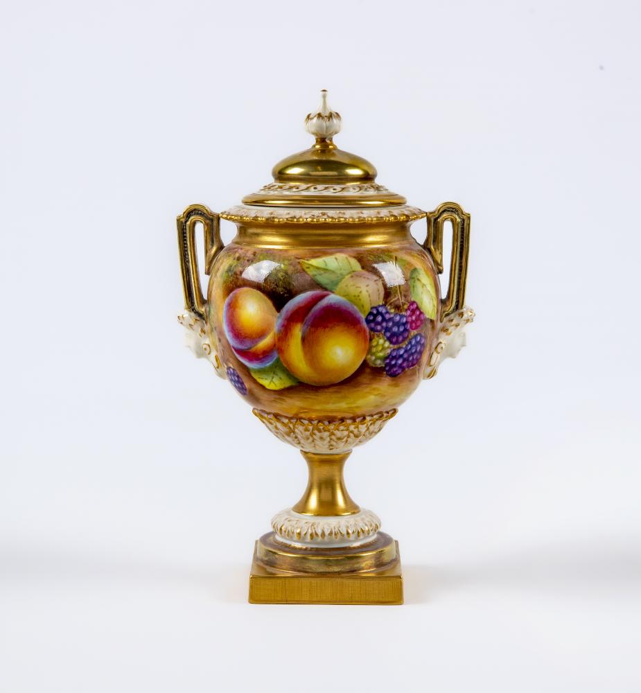 A ROYAL WORCESTER CHINA VASE AND COVER Image