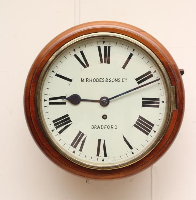A MAHOGANY WALL TIME PIECE signed M. Rhodes & Sons Ltd Image