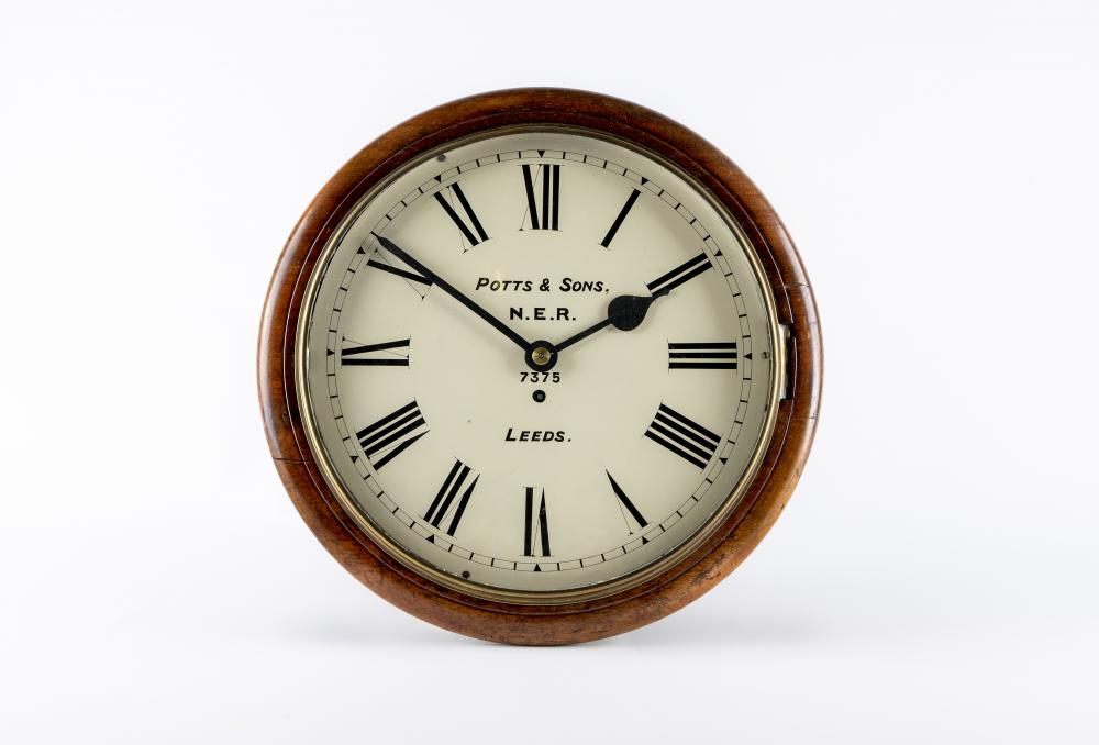 A MAHOGANY CASED RAILWAY CLOCK signed Potts & Son Image