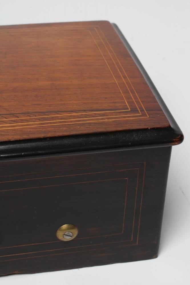 A SWISS MUSICAL BOX Image