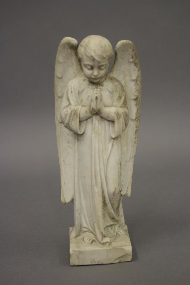 A CARVED WHITE MARBLE FIGURE OF AN ANGEL Image