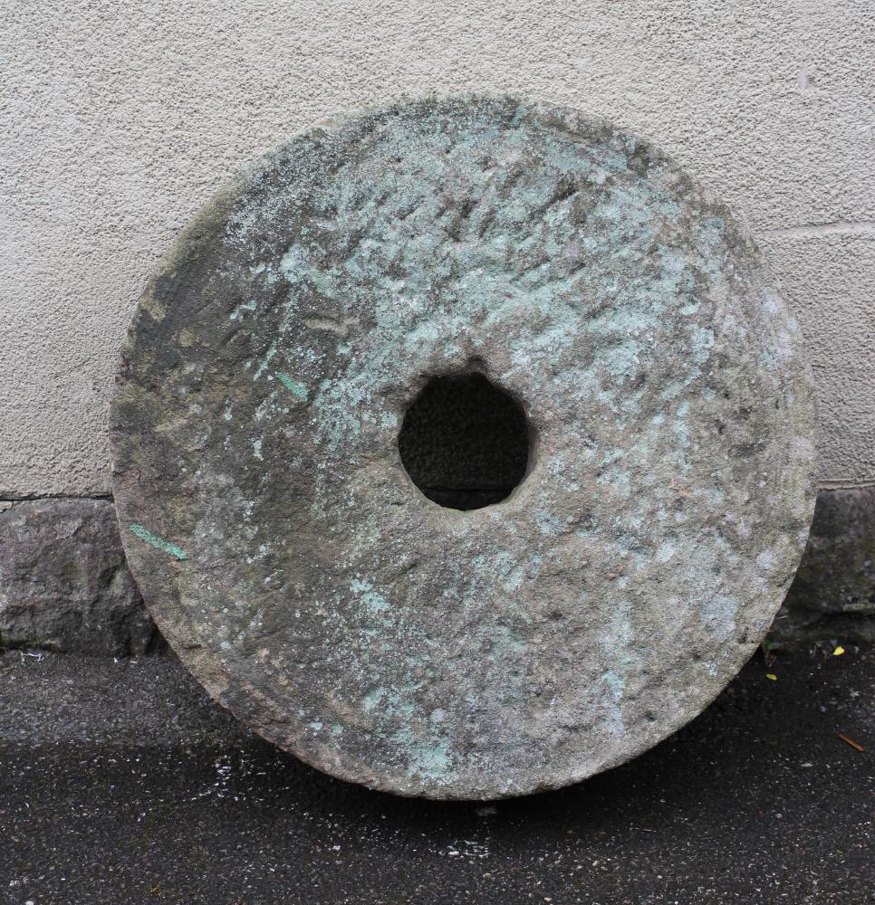A SANDSTONE MILL WHEEL Image
