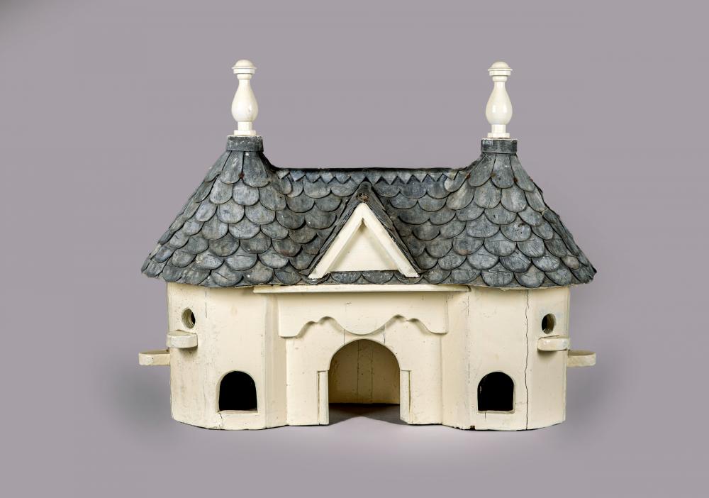 AN EDWARDIAN(?) PAINTED WOOD BIRD HOUSE modelled as a cottage orne Image