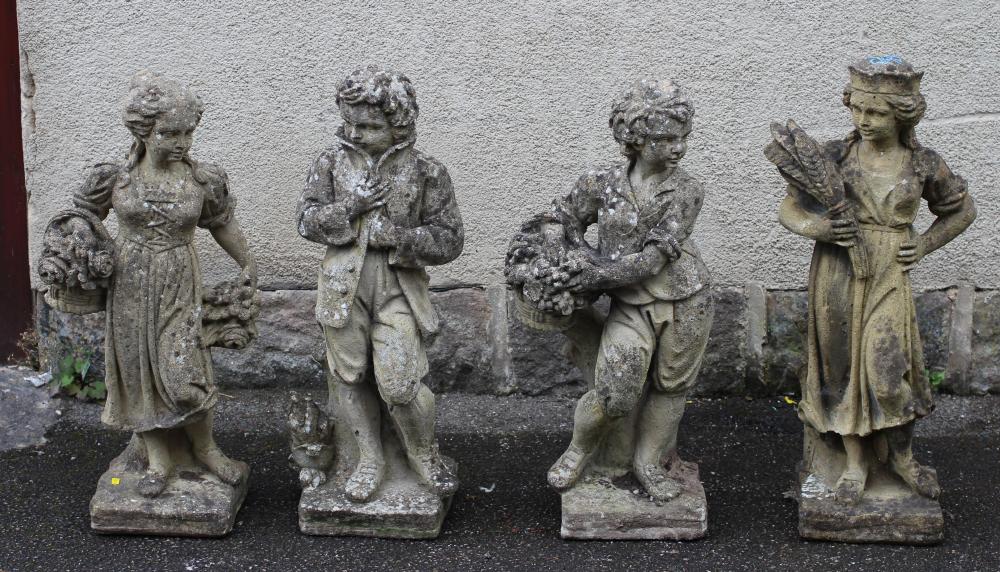 A SET OF FOUR COMPOSITION STONE FIGURES allegorical of the Seasons Image