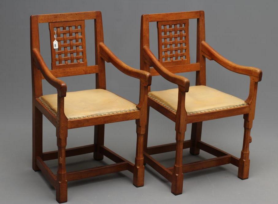 A PAIR OF PETER HEAP ADZED OAK ELBOW CHAIRS Image