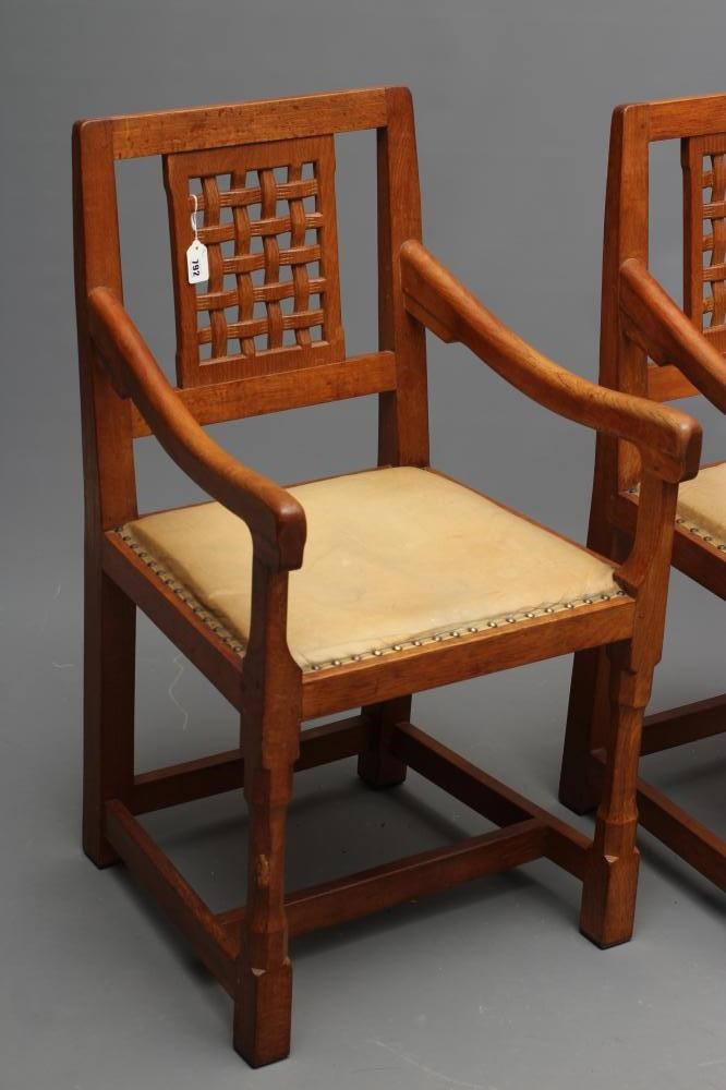 A PAIR OF PETER HEAP ADZED OAK ELBOW CHAIRS Image