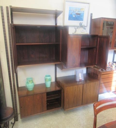 A ROSEWOOD MODULAR ROOM UNIT probably designed by Poul Cadovius Image