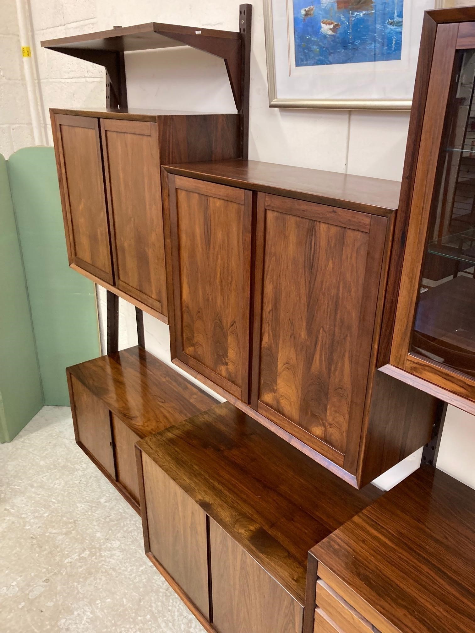 A ROSEWOOD MODULAR ROOM UNIT probably designed by Poul Cadovius Image