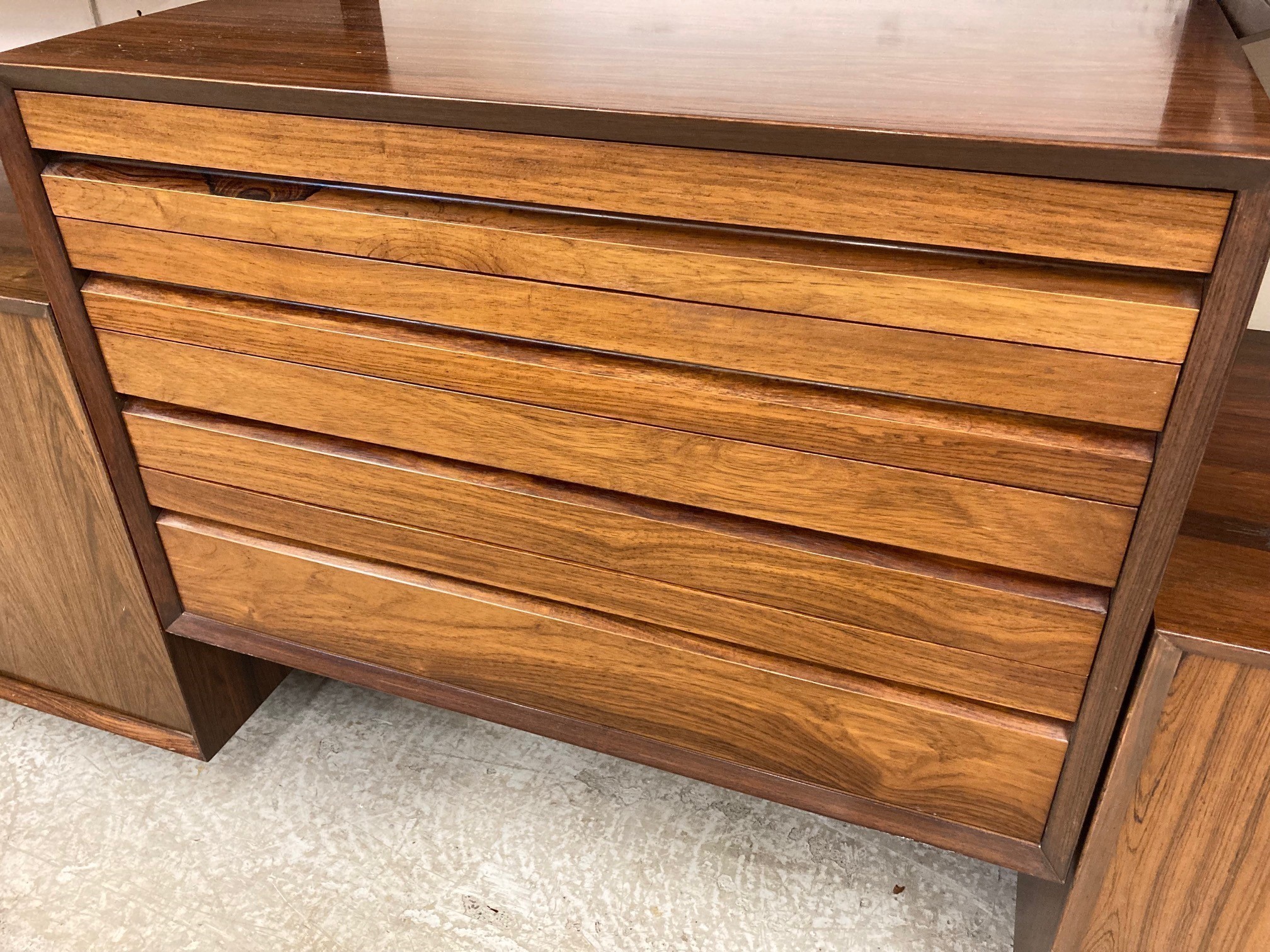 A ROSEWOOD MODULAR ROOM UNIT probably designed by Poul Cadovius Image