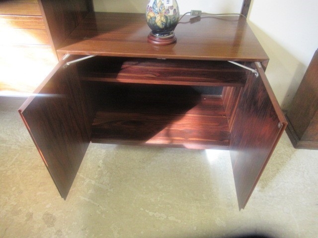 A ROSEWOOD MODULAR ROOM UNIT probably designed by Poul Cadovius Image