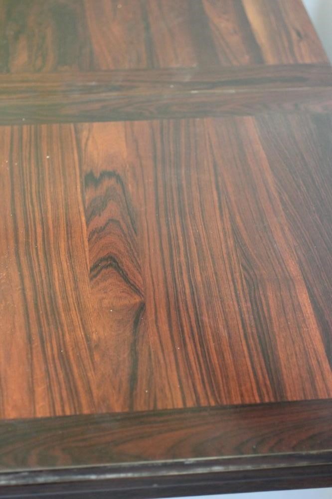 H.W.KLEIN FOR BRAMIN- A ROSEWOOD DINING TABLE AND CHAIRS Image