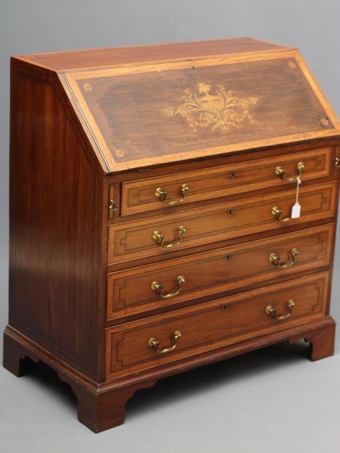 A MAHOGANY AND SATINWOOD BANDED BUREAU by Edwards & Roberts Image