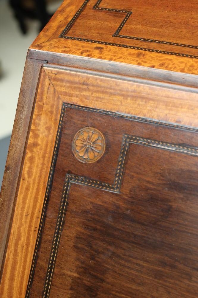 A MAHOGANY AND SATINWOOD BANDED BUREAU by Edwards & Roberts Image
