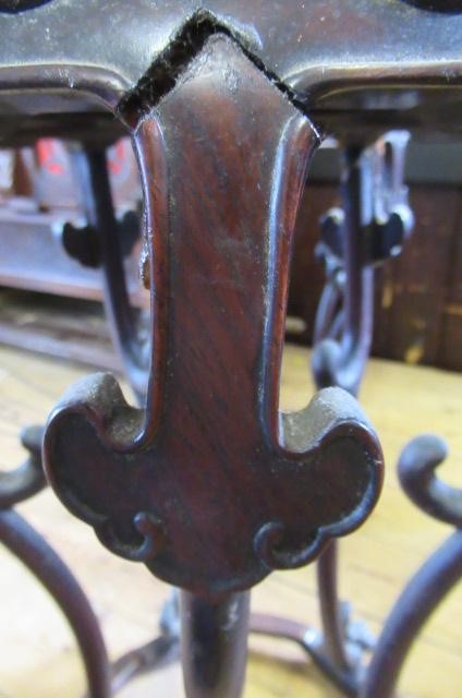 A PAIR OF CHINESE PADOUK WOOD JARDINIERE STANDS Image