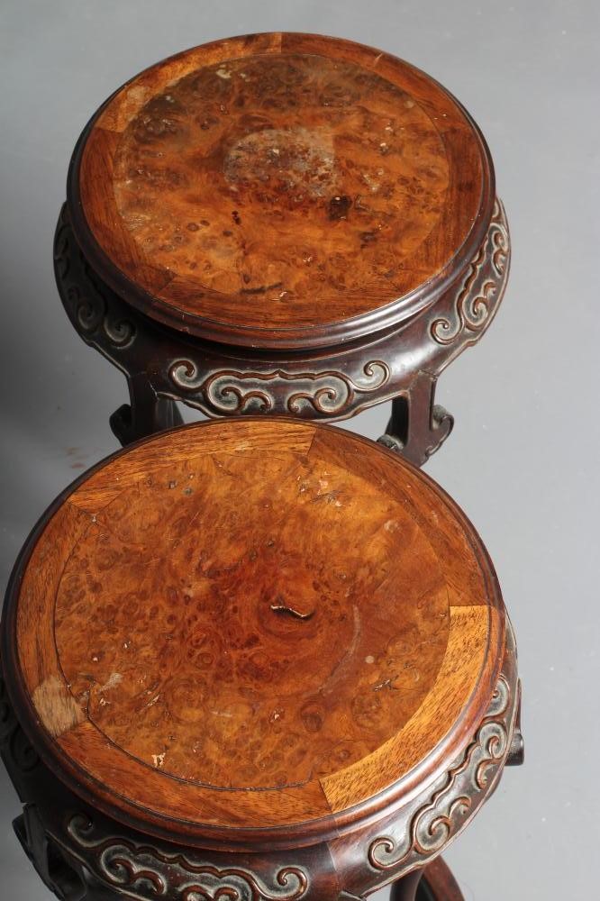 A PAIR OF CHINESE PADOUK WOOD JARDINIERE STANDS Image