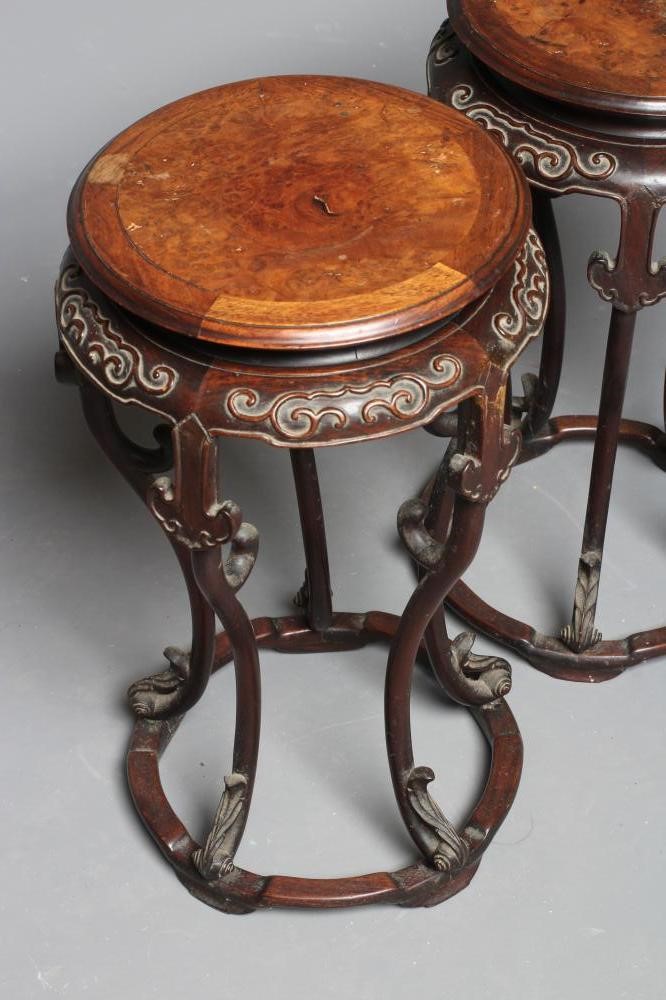 A PAIR OF CHINESE PADOUK WOOD JARDINIERE STANDS Image