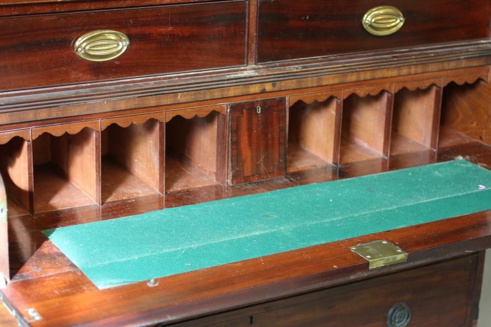 A REGENCY MAHOGANY AND EBONY STRUNG SECRETAIRE LINEN PRESS Image