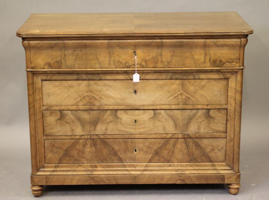 A FRENCH BLEACHED WALNUT COMMODE Image